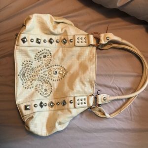 White studded/sequel fleur de leis purse